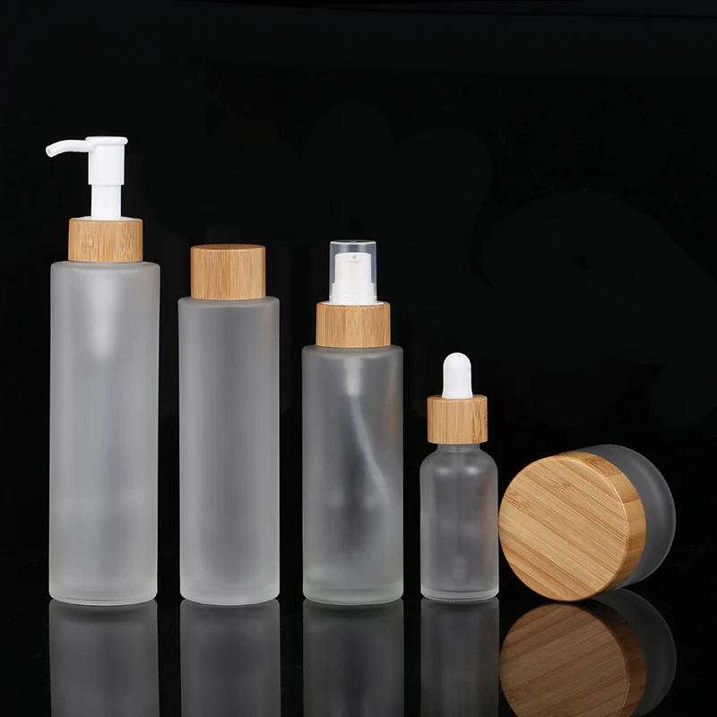 

Eco Friendly 120ml Frosted Glass Spray Empty Lotion Bottle Cylindrical Liquid Foundation Bottle with Bamboo Pump
