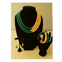 

Custom Sorority Pearl Necklace Bracelet Set Chi Eta Phi Green and gold Pearl Necklace