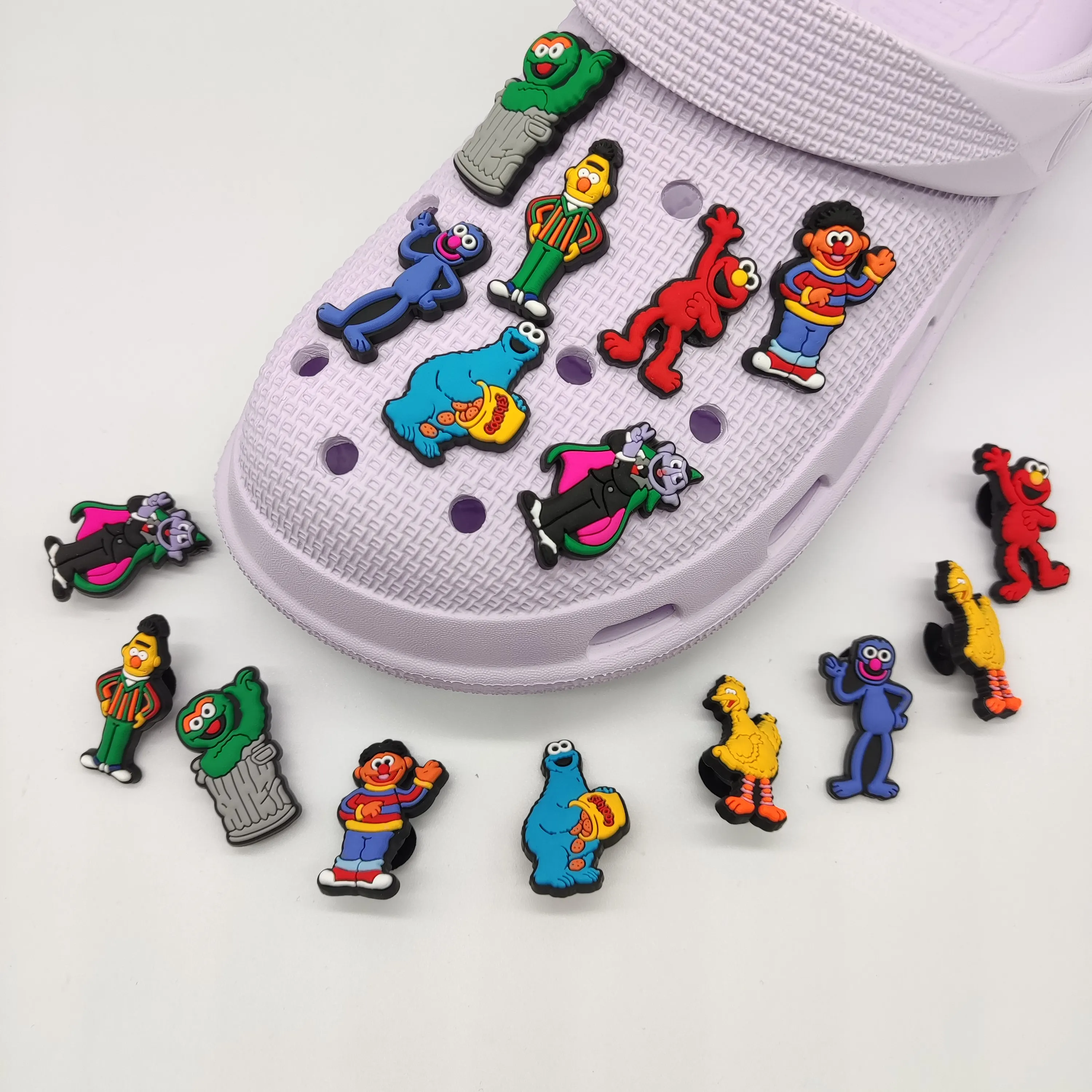 

Custom logo wholesale Sesame street PVC Factory direct sales croc charms new decor Money Heist shoes buckle croc shoe charms