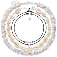 

Artilady Amazon Supplier Natural Sea Shell Boho Handmade Cowrie Pearl Puka Shell Choker Necklace Jewelryfor Women girls