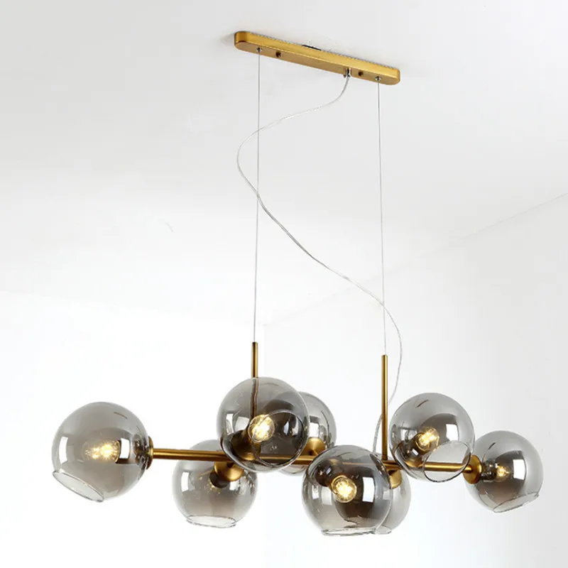 

Nordic style lamps post-modern long-shaped dining room lamp creative living room magic bean glass molecular chandelier