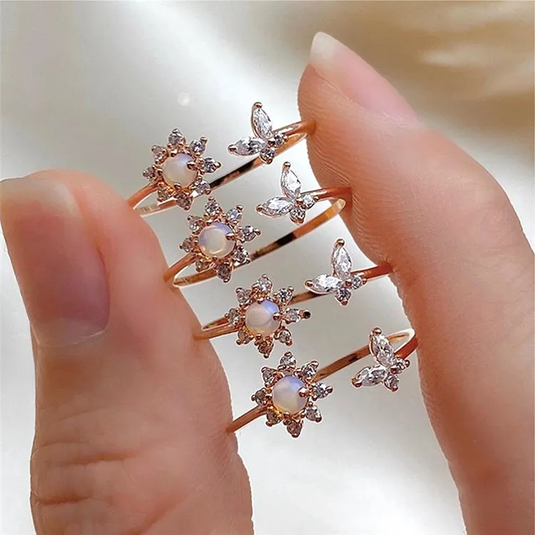 

Best selling jewelry temperament dream opal sunflower ring system simple sweet butterfly open female ring, Picture shows