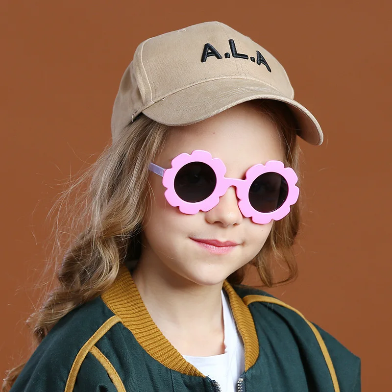 

Hot sale Lovely TPEE frame round flower kids sunglasses 2021, Custom colors