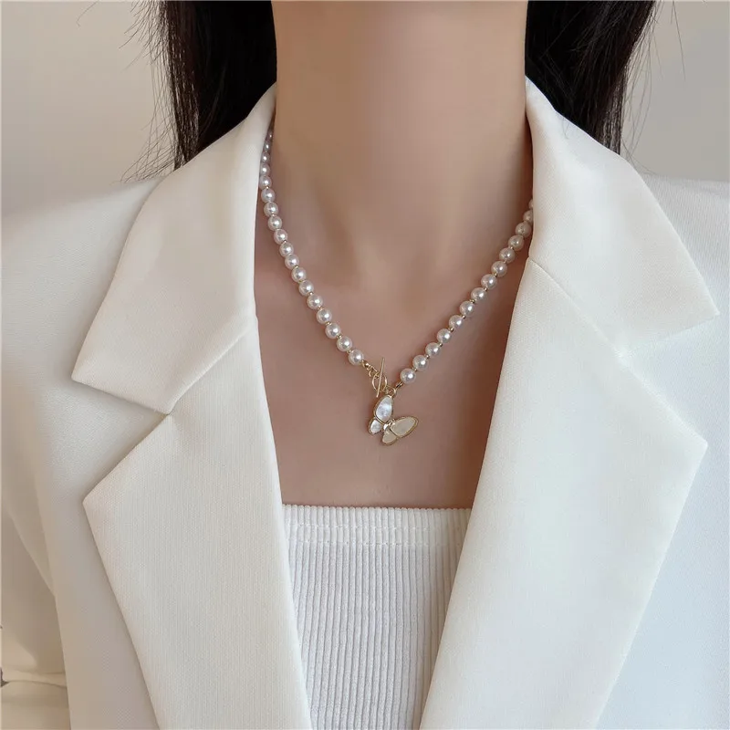 

Temperament net red butterfly pearl necklace female ins cold wind niche design sense clavicle chain simple short necklace