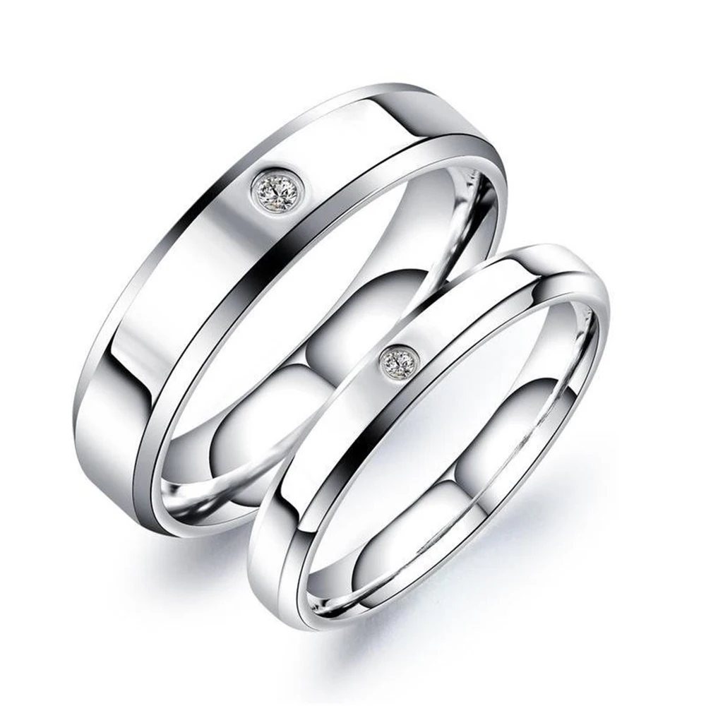 

Simple design a Zircon stones center stainless steel for men/women for Wedding