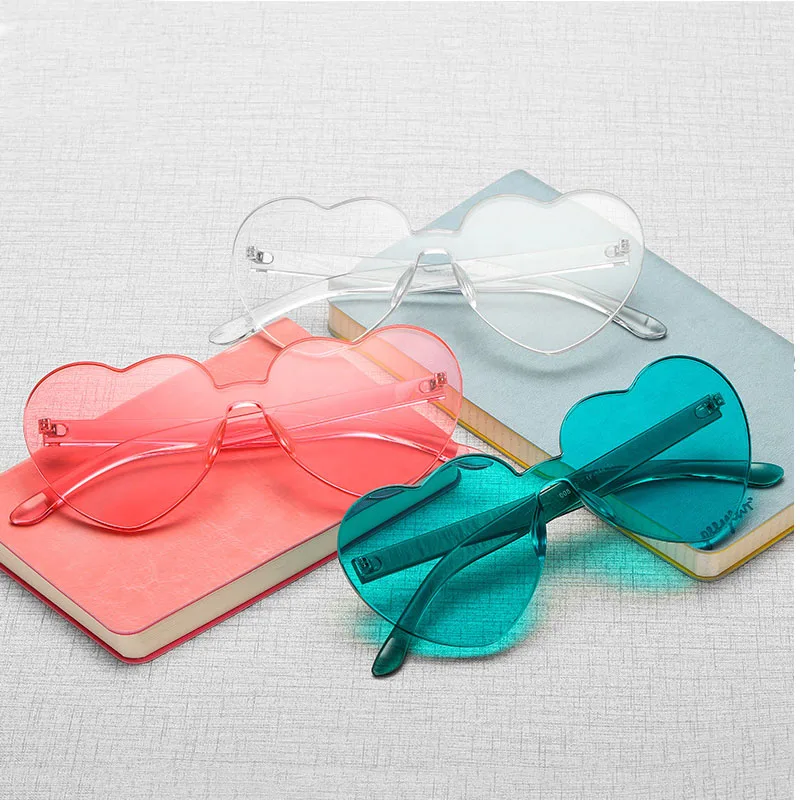 

The latest heart-shaped candy color rimless heart sunglasses women UV400 protection are cute oem sunglasses custom logo wenzhou