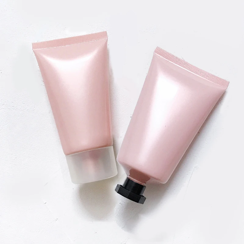 

Free Sample Pink Plastic Cosmetic Tube Empty 60ml Soft Tube Hand Cream Facial Cleanser Squeeze Tubes with Octagonal Lids