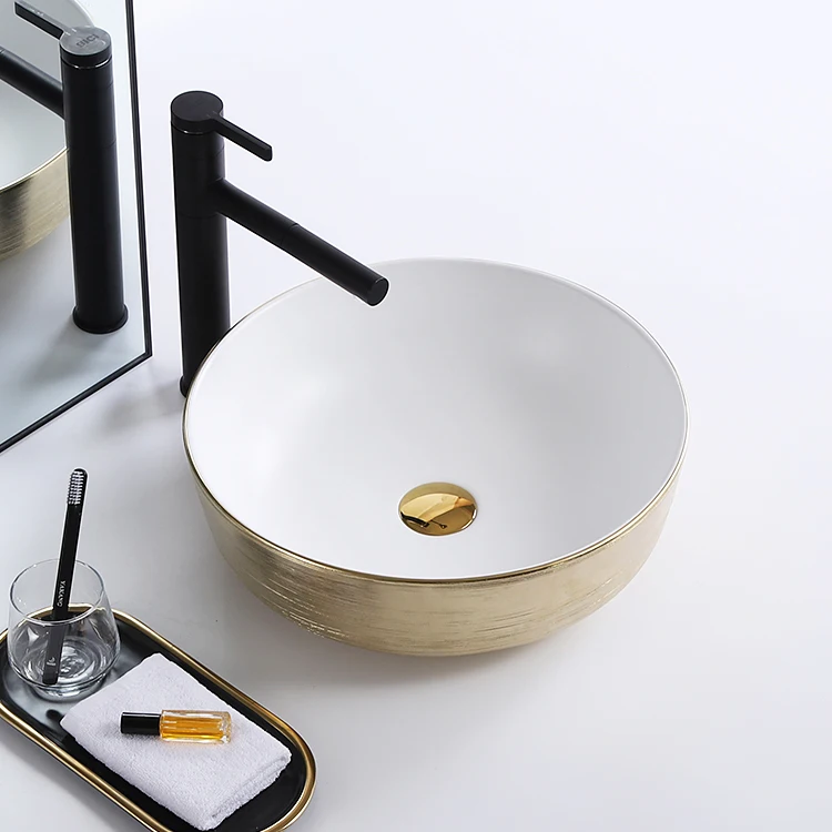 Modern novel design round small plating rose gold black color luxury countertop ceramic sink art washbasin hand wash basin factory