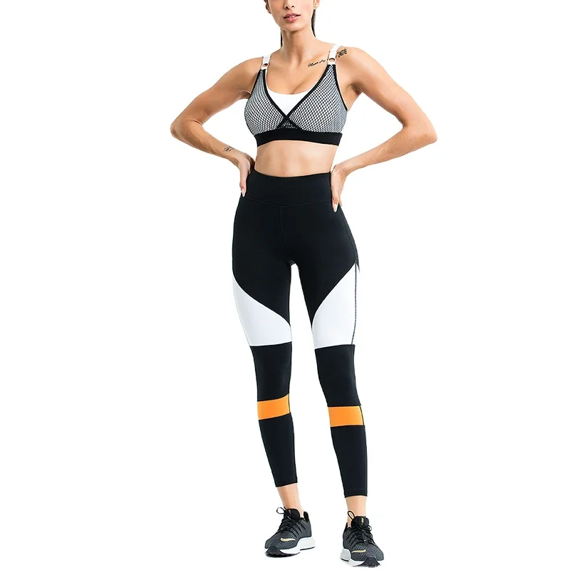 

2020 new European and American cross-border Yoga Suit Women's quick-dry Mesh Yarn splice color show butt fitness suit