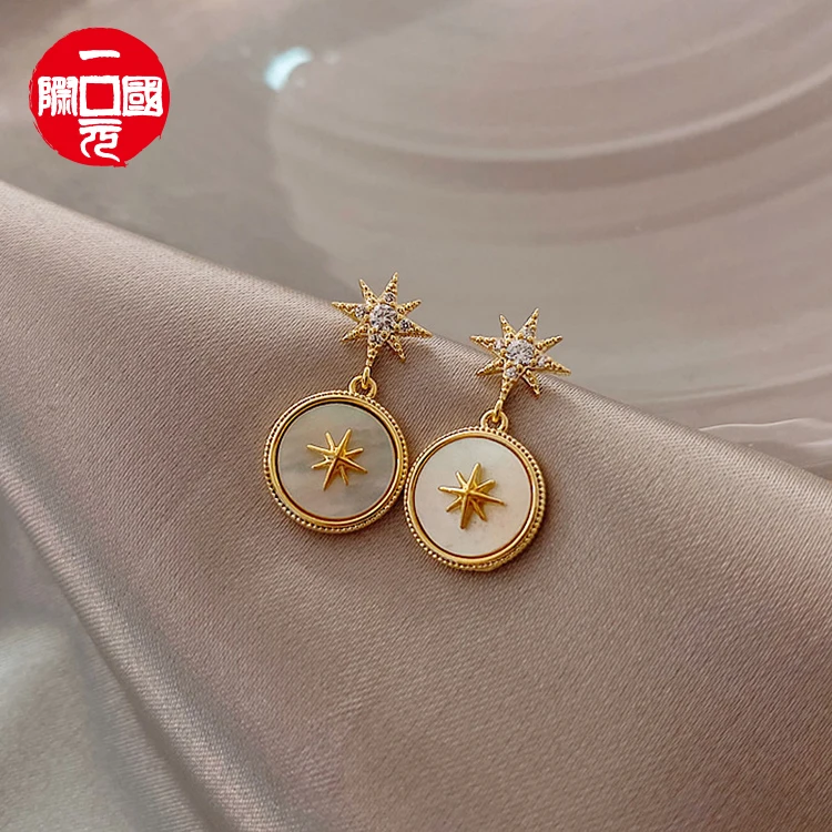 

2021 new hot sale eight-pointed star earrings golden retro palace style