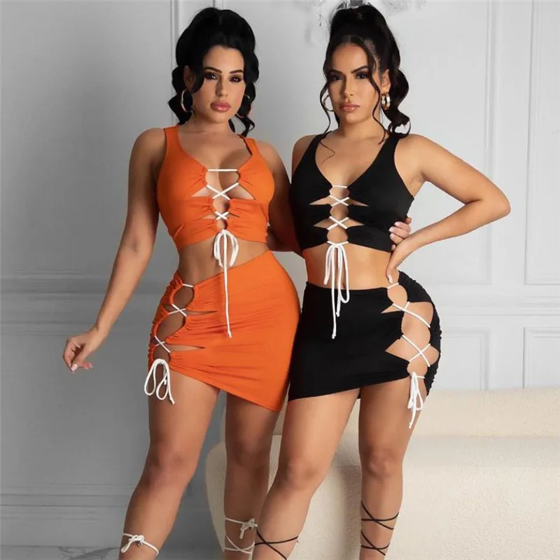 

EB-20031911 2021 New arrivals hot selling women sexy crop top women skirts bandage fashion casual two piece skirt set, 2 colors