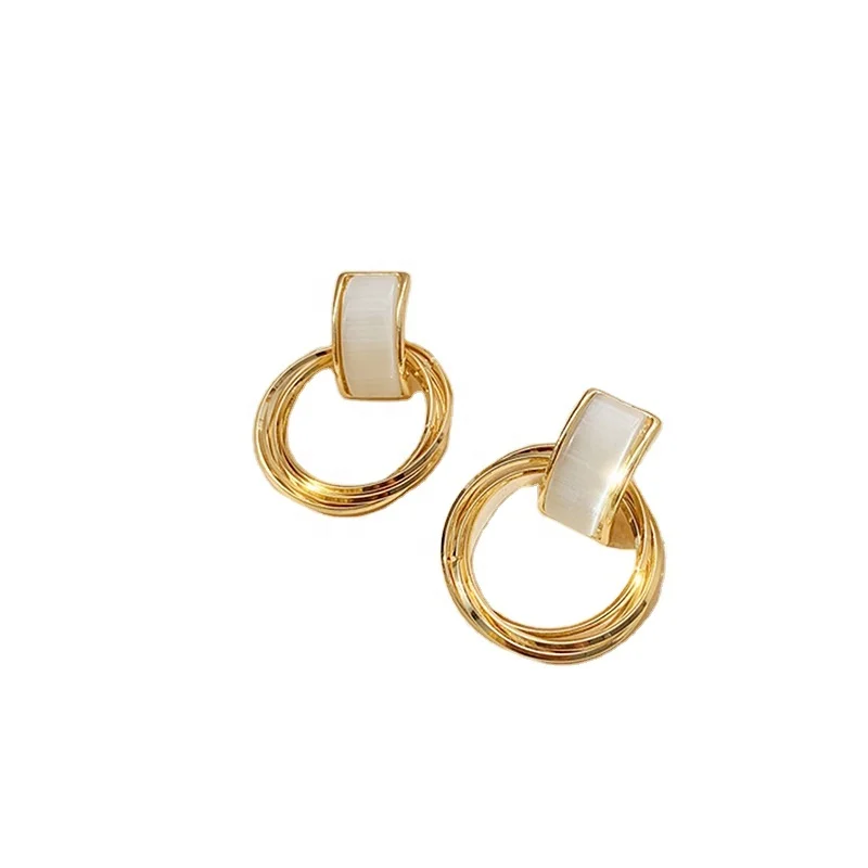 

Korean s925 sterling silver circular pendant the cat's eye earrings