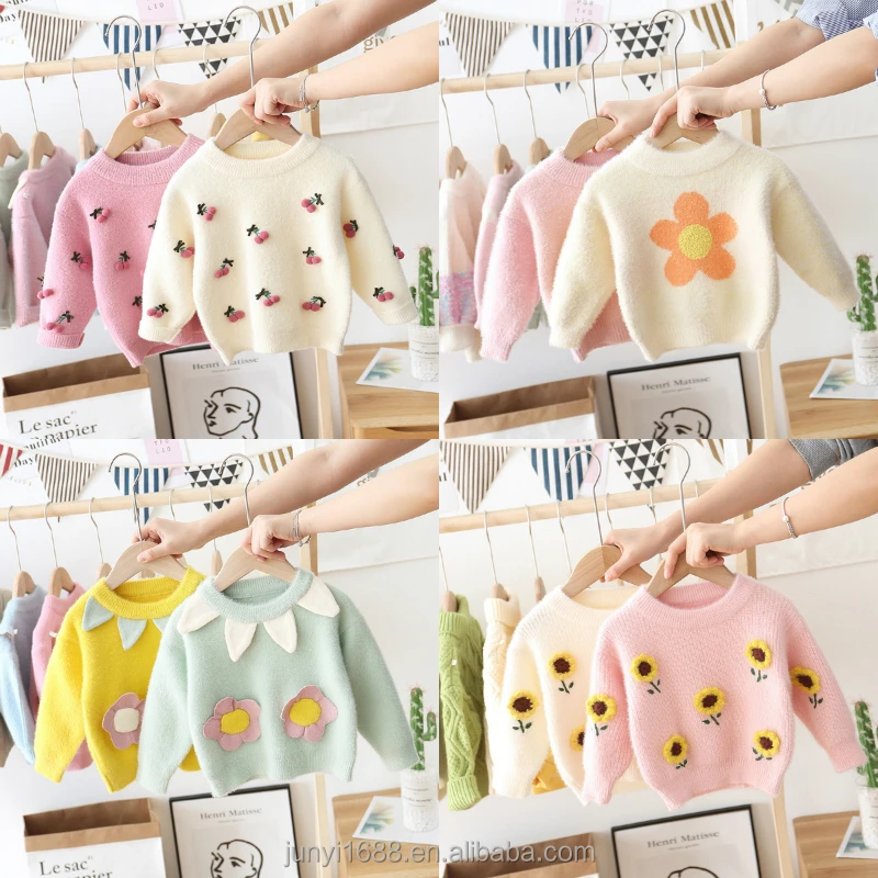 

Boys wear warm children's sweaters and new children's pullovers