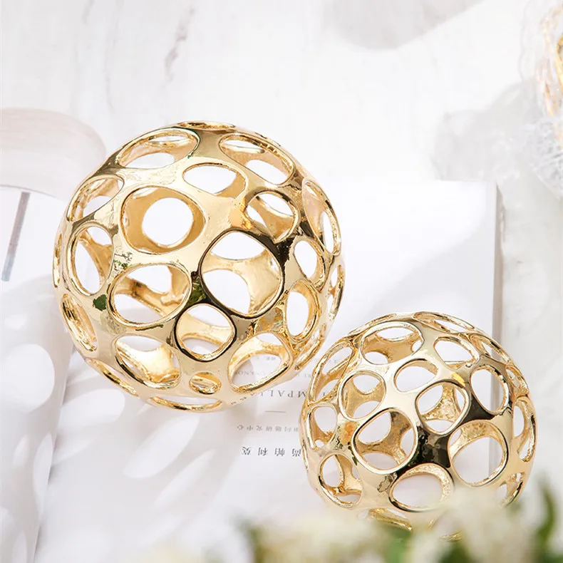 

Modern luxury home decor ornaments home decoration accessories gold hollow out metal ball Ornaments