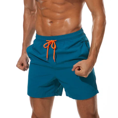 

Beach shorts stock high quality custom logo printed mens swim trunks, oem quick dry men swimming shorts