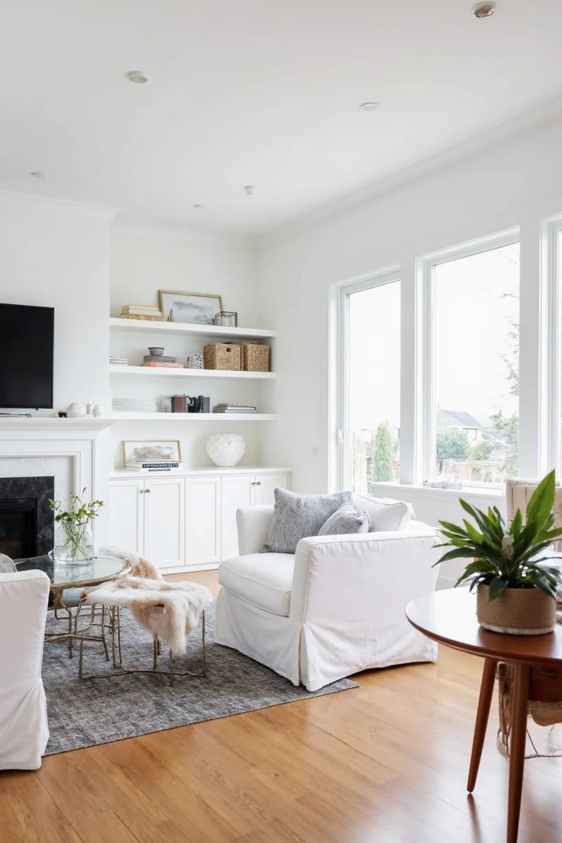 Final styled living room with built-in cabinets