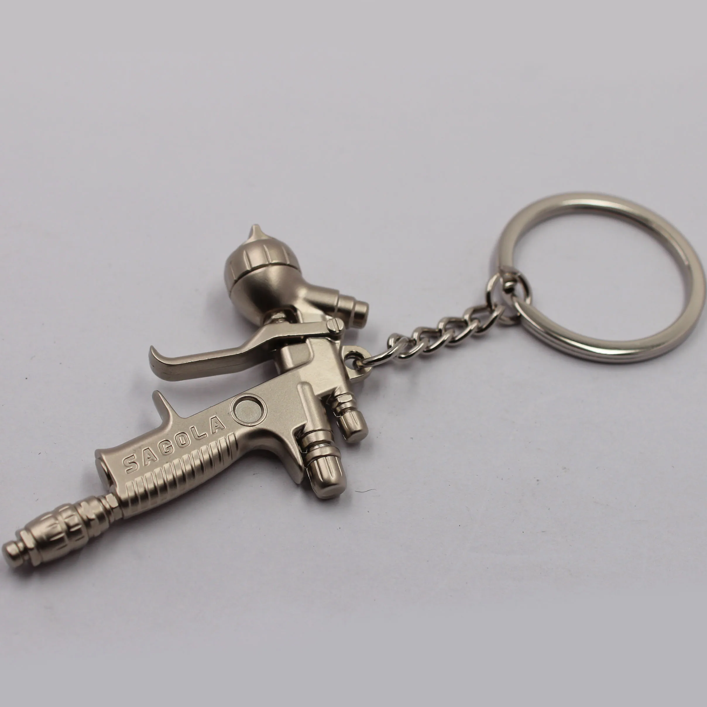 Hot Sale 3d Pearl Nickel Jet Spray Gun Keychain For Kids Men Perfect Gift Souvenir Buy Custom