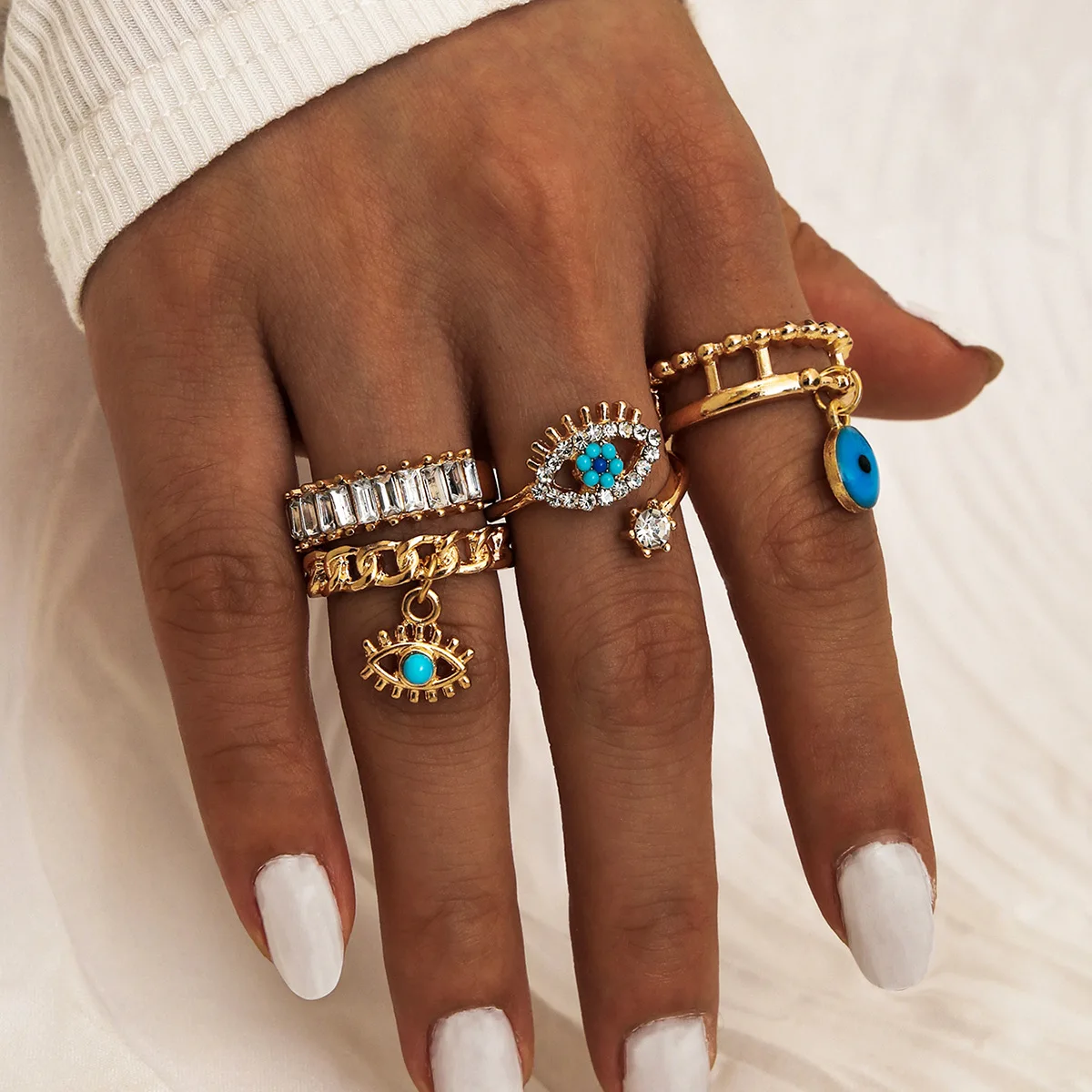 

Punk 4Pcs/Set Drop Oil Turkish Blue Eye Finger Ring Bling Rhinestone Crystal Cuban Chain Evil Eyes Hip Hop Ring Set For Women