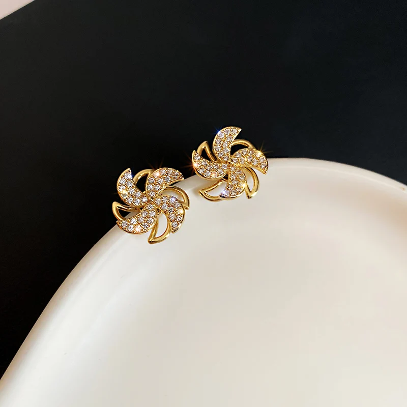 

fashion crystal flower stud rotatable earrings