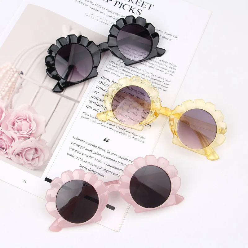 

2020 fashion kids eyewear plastic shell shape kids sunglasses