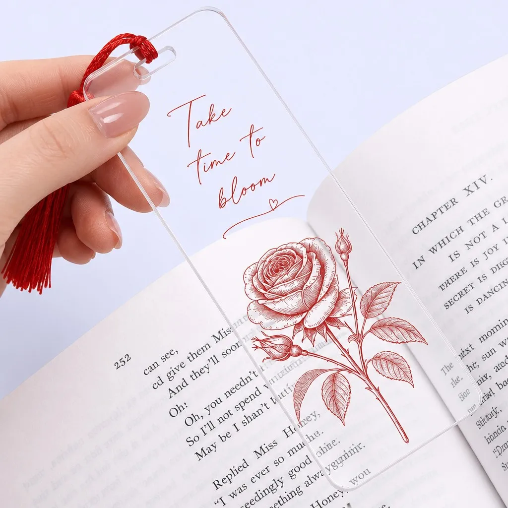 Crystal clear acrylic bookmark held in hand