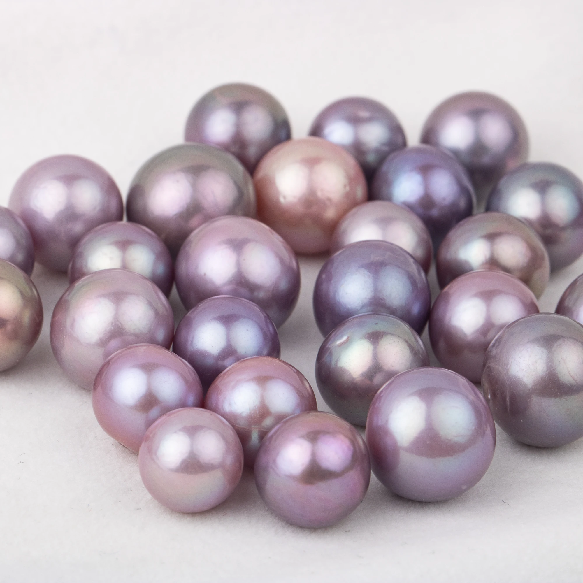 

9-12mm cultured purple Edison Pearl High quality loose freshwater pearl round shape