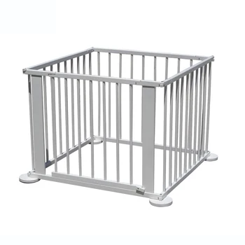 white wooden playpen