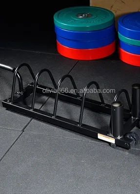 Movable barbell plate holder