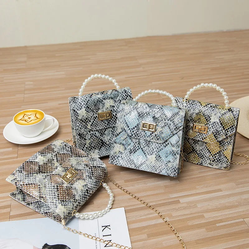 

Foreign Trade 2021 New Pearl Portable Mobile Phone Bag Chain Small Square Bag Snake Pattern One Shoulder Slanting Cross Women, Multi color