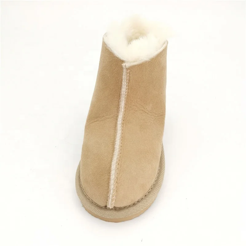 
HQS-KS001 OEM customized premium quality winter thermal genuine sheepskin slippers for children. 