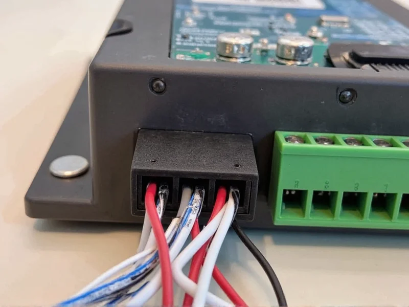 Close-up of MPPT charge controller wiring connections