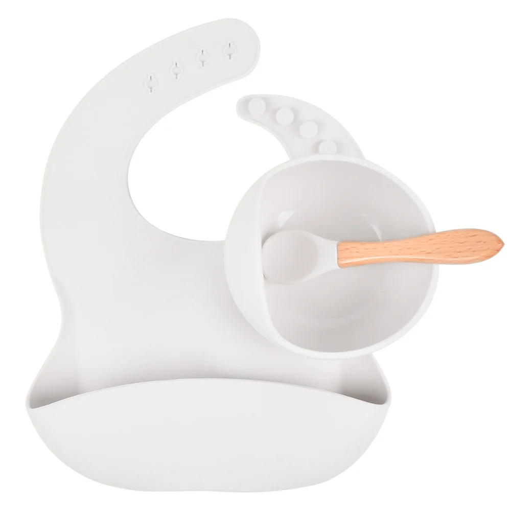 

Leak-proof silicone bib, food grade silicone bowl wooden handle silicone spoon, baby tableware 3 feeding set