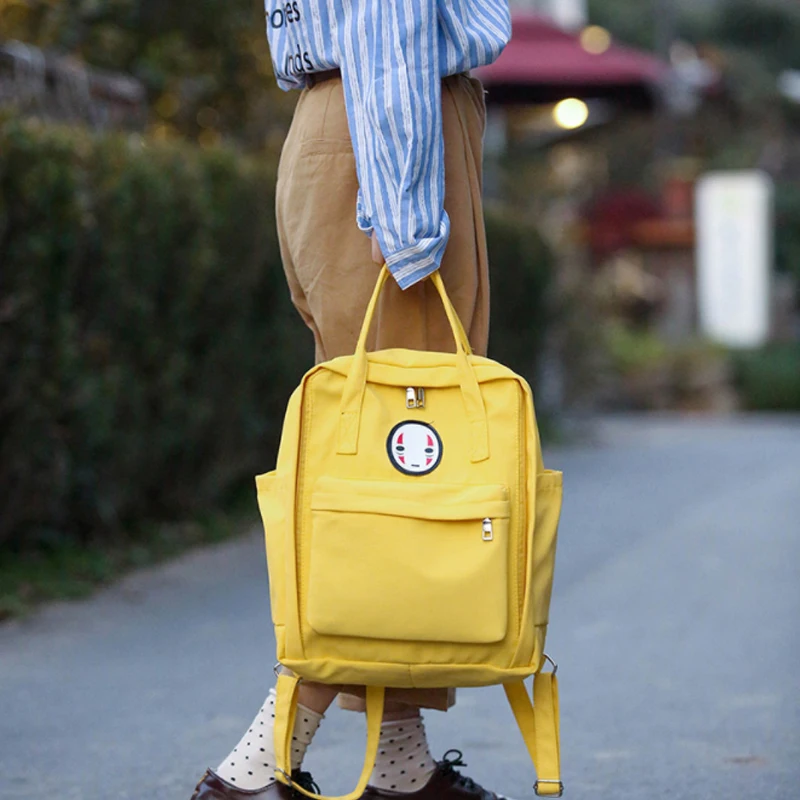 

2020 new summer couple backpack faceless male backpack female Harajuku style ulzzang female middle school student schoolbag