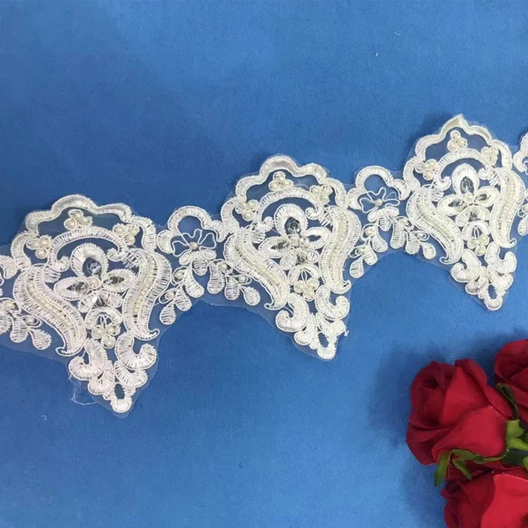 

Wholesale Stock dress Beaded Pearl border cord wedding dress bridal gowns wedding lace applique dentelle mariage