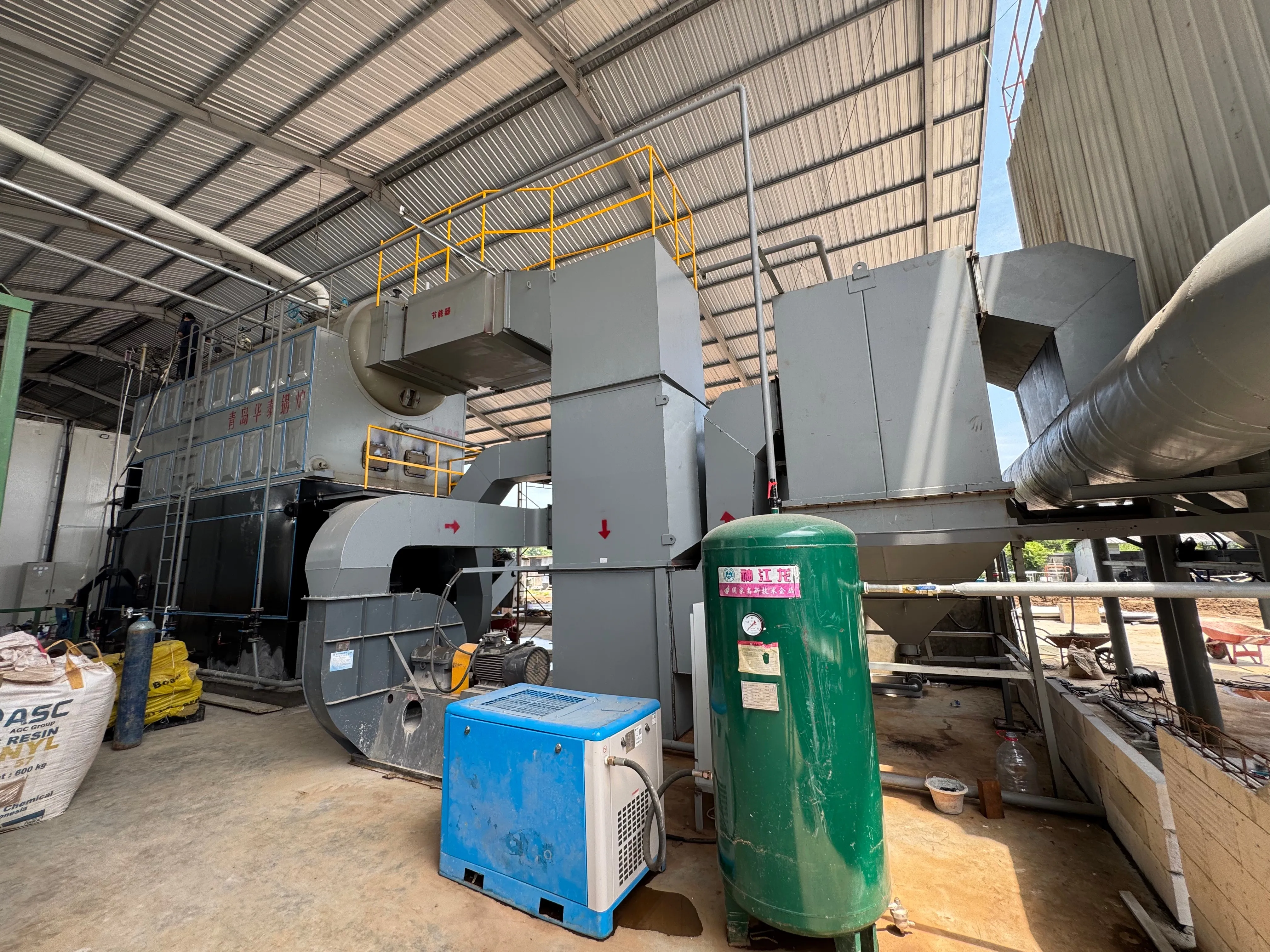 Dust collector induced draft fan system