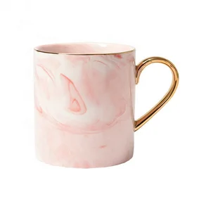 Image of promotion customized V shape pink marble gold plated ceramic mug with gold handle
