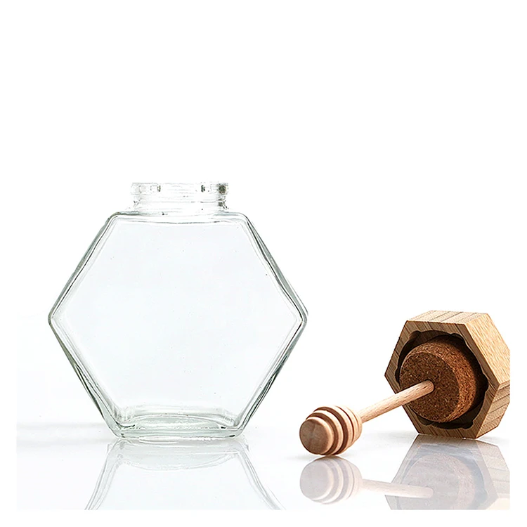 

Wholesale Clear Custom Logo Hexagon Glass Jar With Bamboo Lid And Dipper