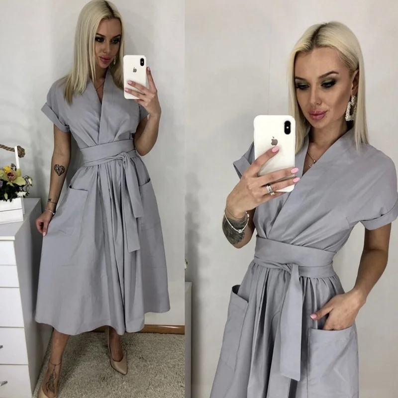 

The new fall 2020 women's casual V-neck solid color big pocket dress Girls' Skirts