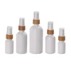 /product-detail/bamboo-cosmetic-bottle-empty-opal-white-oil-glass-bottle-5-10-15-20-30-50-100-ml-with-bamboo-serum-pump-60749371986.html