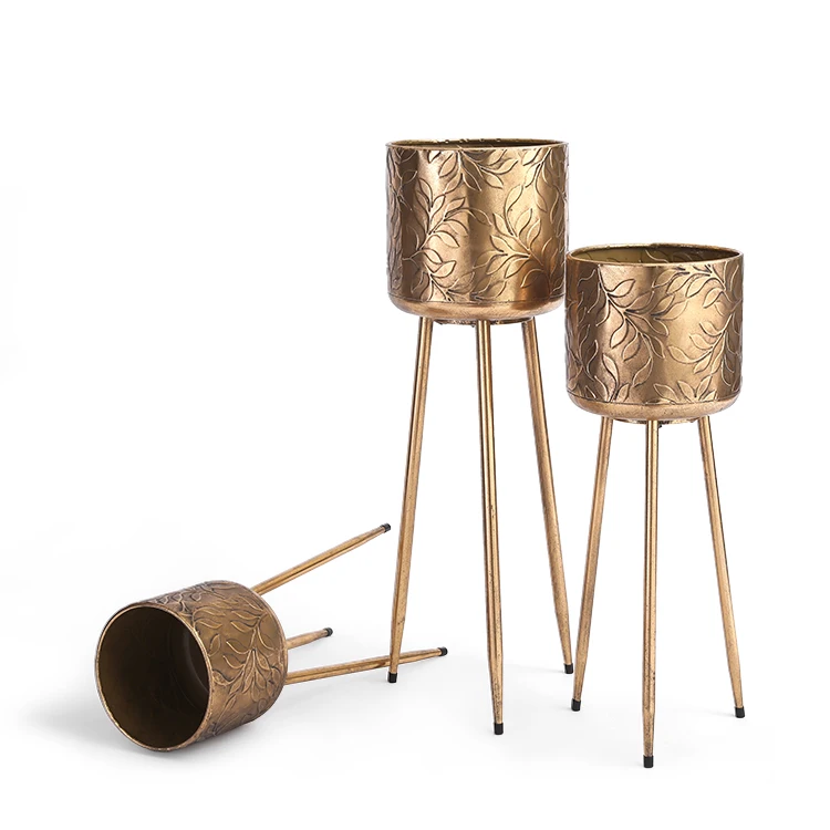

Gold tall antique paint plant stand indoor