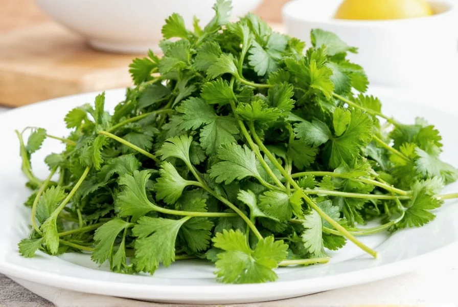 Fresh cilantro leaves on a wooden table