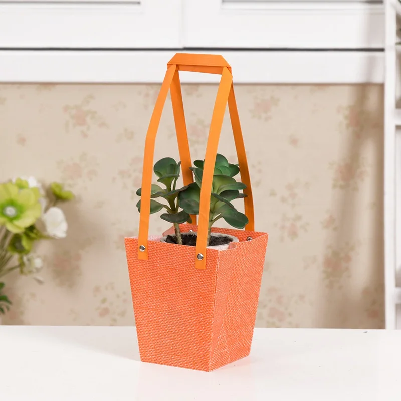 

non woven trapezoid bag with rivet handle