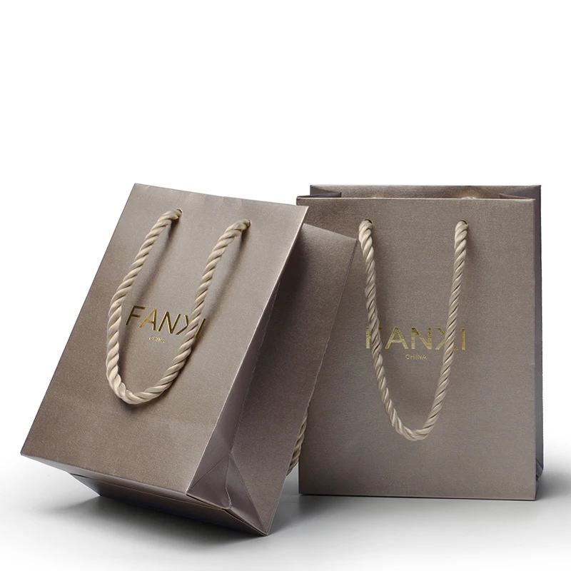 

Hot selling Morden Luxury Special texture Coated Paper Bag Jewelry Packaging Bag with Handle Recycle rope Shopping Bags, Coffee