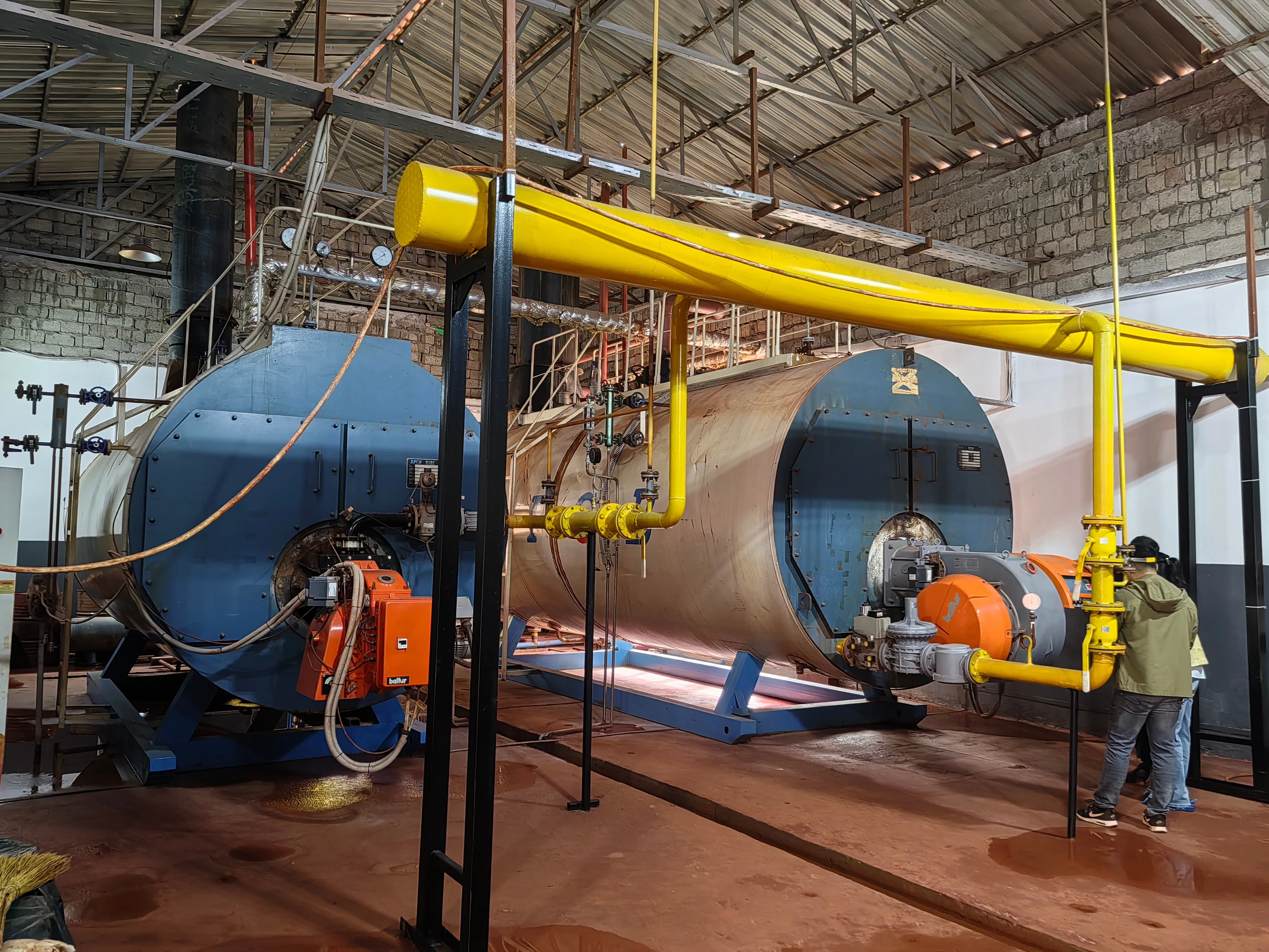 Two EPCB WNS gas steam boilers 10T and 6T at Uzbekistan beverage factory