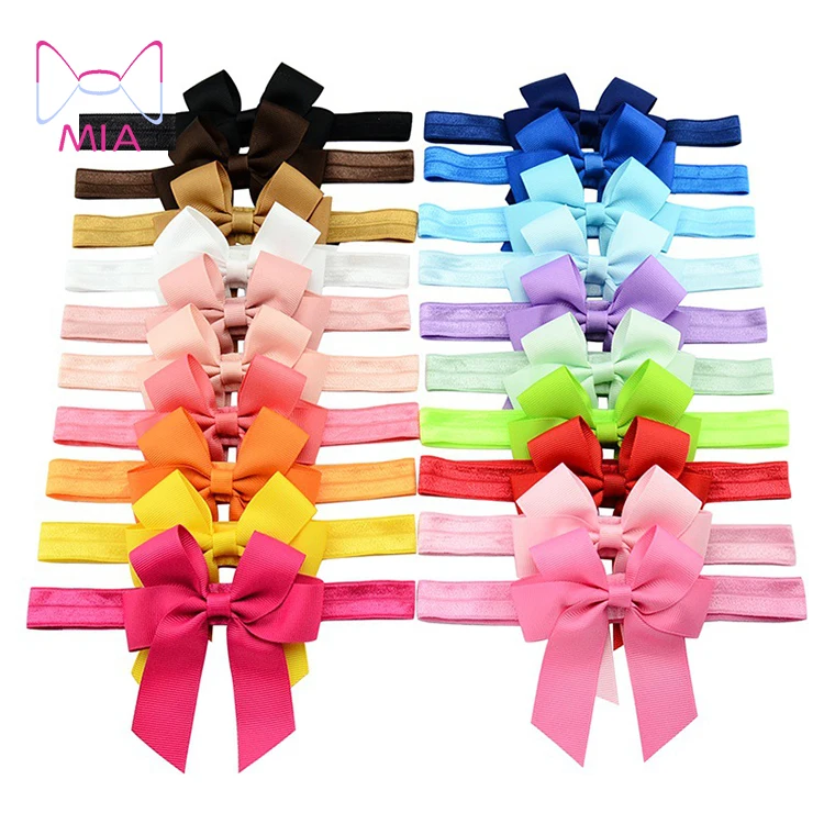 

Free Shipping decorative solid ribbon cheer leading bow tie elsastic hairband new born baby headwear 618, Picture shows
