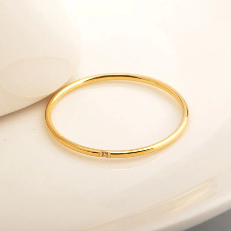 

Minimalist Design 316L Stainless Steel Zirconia Ring Titanium Steel 18K Gold Plated Tiny Diamond Ring For Wedding Engagement