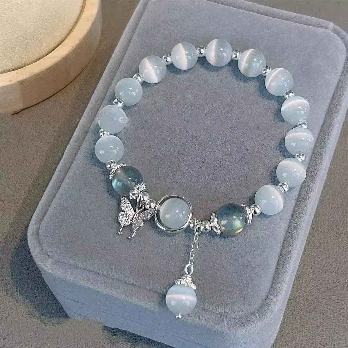 

Hot Fashion Butterfly Cat's Eye Adjustable Blue Opal Butterfly Charm Bracelets