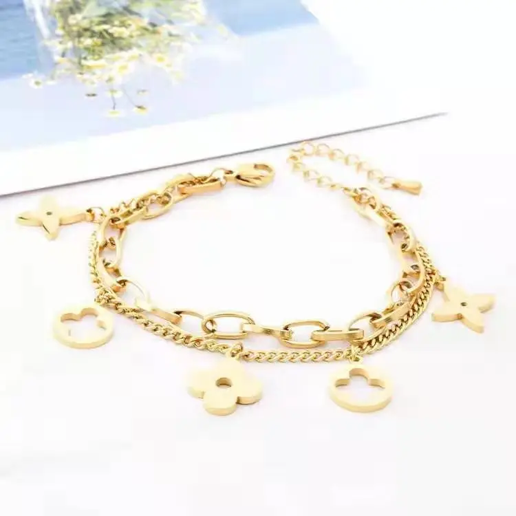 

Manufacturer custom four leaf clover charm 2021 Fashion Women jewellery 316l Stainless Steel body chain jewelry