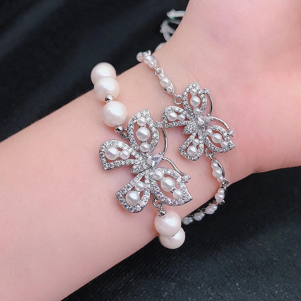 

Luxury Female Crystal Butterfly Chain Bracelet Trendy Silver Color Pearl Bracelets For Women Luxury Zircon Stone Party Bracelet, Picture shows