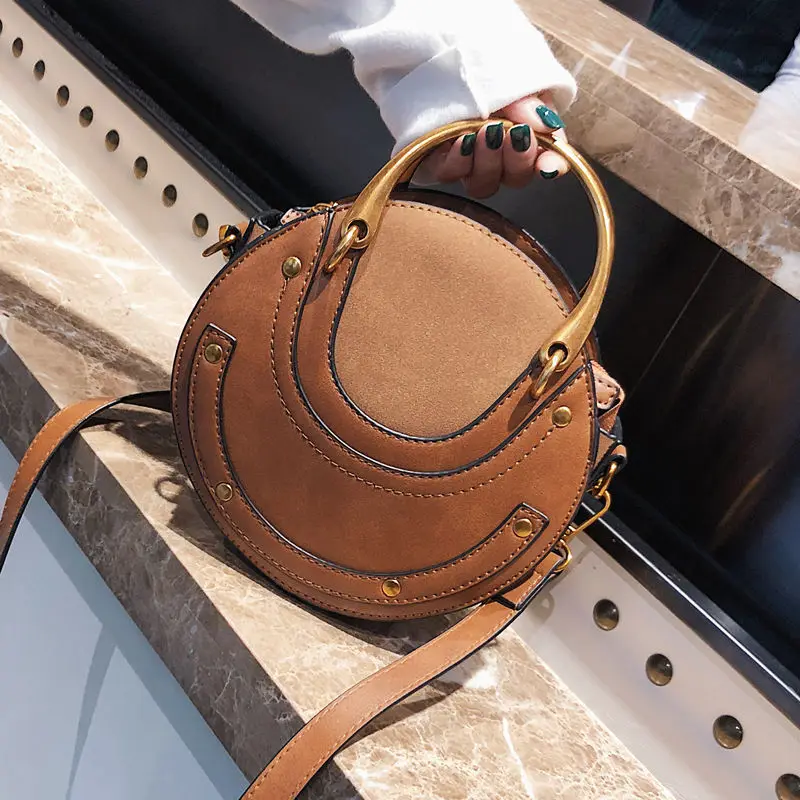 

New fashion 2022 round bags girls popular hand bag women's design rivets handbag customized Purses